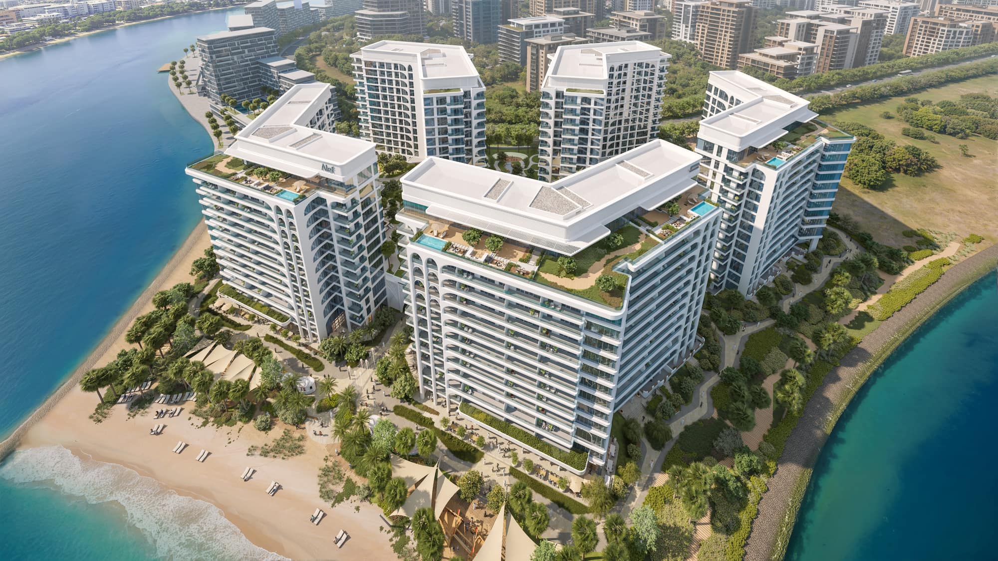 Aerial of the five residential buildings between the beach and Al Khan Lagoon